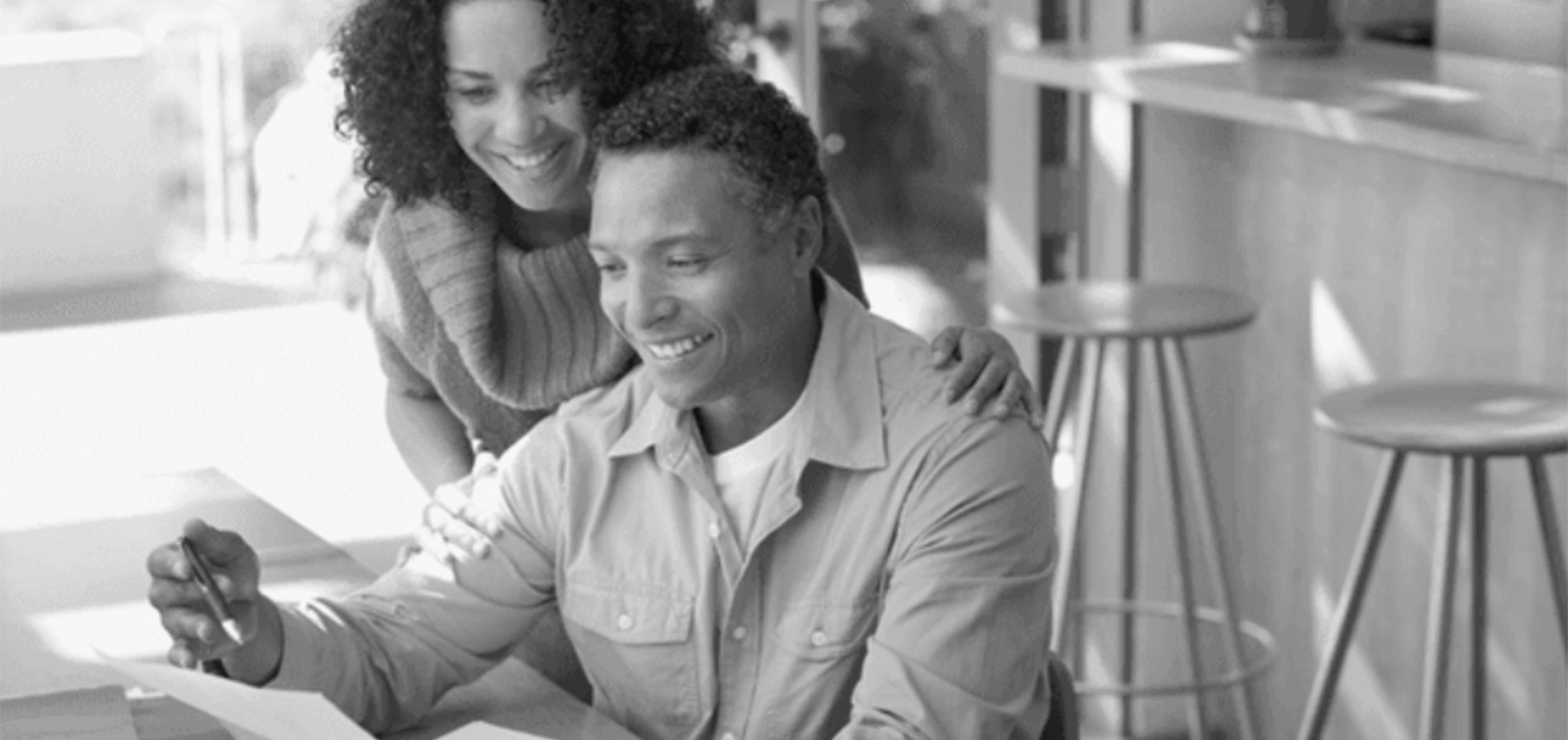 a couple goes over their bank statements together