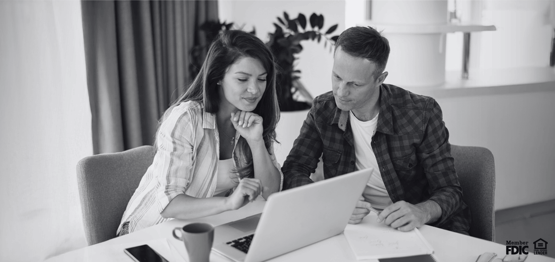 Couple discussing their mortgage finances.