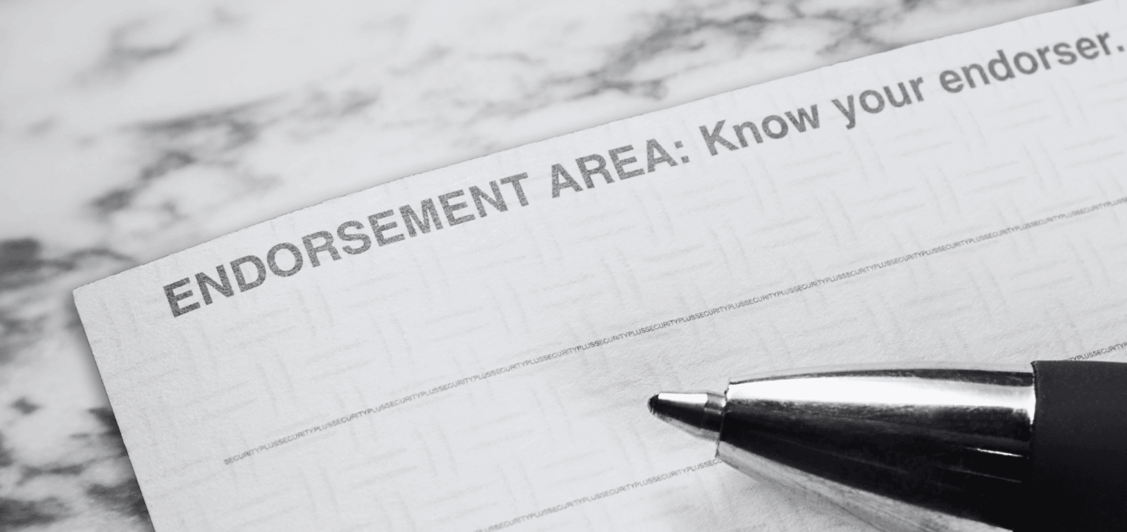 Back of check endorsement area to deposit money into a bank account.
