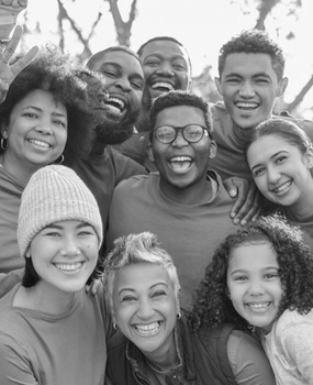 a group picture of a diverse community of people. 