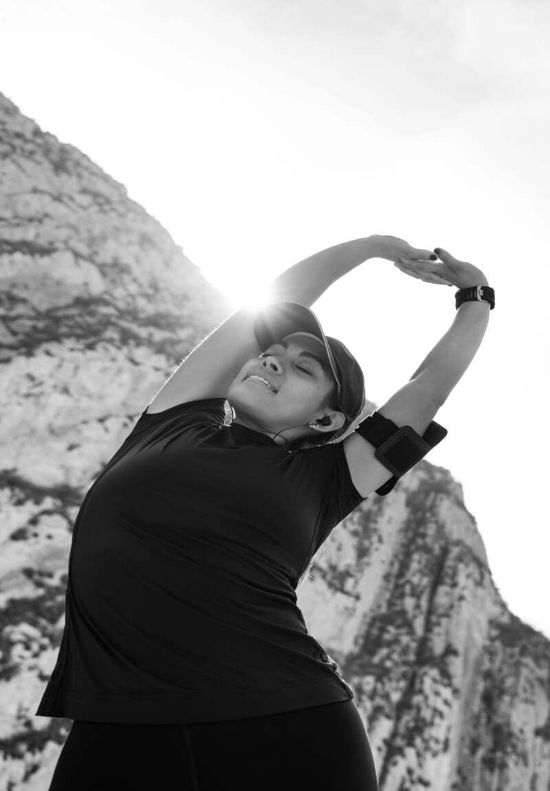 Woman stretching outside during her work out
