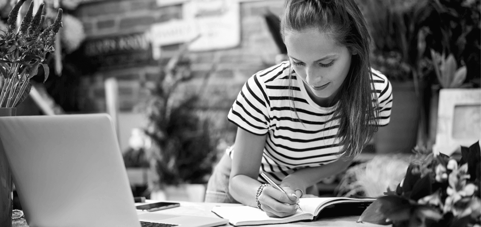 a business woman balances her books to avoid fraudulent costs