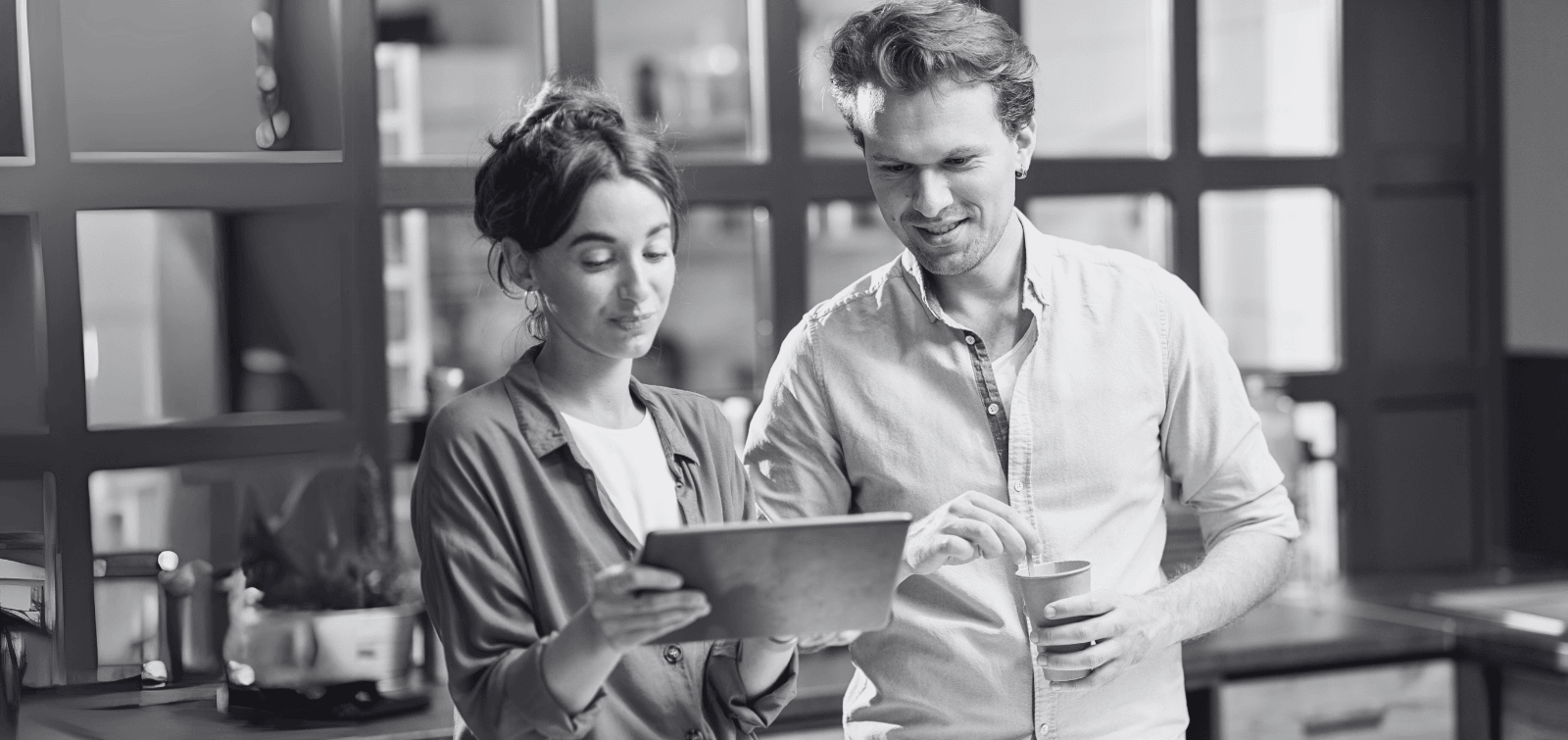 Two small business owners weighing the pros and cons of SBA loans for business.